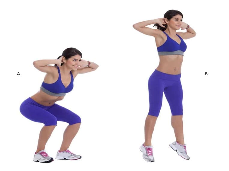 Jeune femme réalisant l'exercice de jump squat